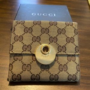 SOLD Gucci GG tan w/ gold hardware compact wallet